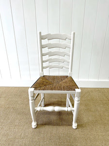 A Set of 4 Ladderback Rush Seat Chairs Painted White