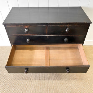 An Ebonized Antique English Chest of Drawers/Dresser