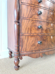 A Large Antique English Bow Front Mahogany Chest of Drawers