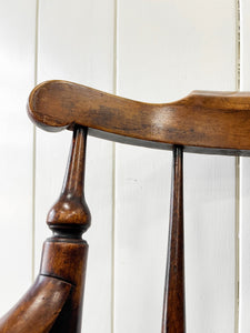 An Antique Penny-seat Stick Back Arm Chair