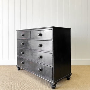 An Ebonized Antique English Chest of Drawers/Dresser