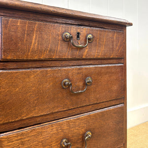 A English Georgian Chest of Drawers with Swan Neck Hardware