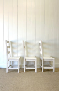 A Set of 6 Ladderback Chairs Painted White