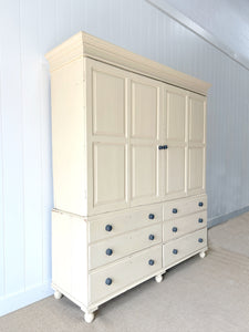 A Very Large and Useful English Pine Painted Housekeepers Cupboard