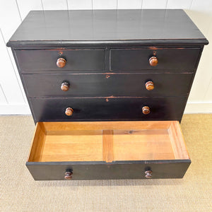 An Ebonized Antique English Chest of Drawers/Dresser