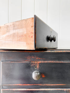 An Ebonized Antique English Chest of Drawers/Dresser