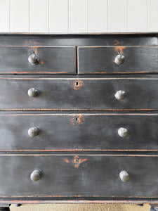 An Ebonized Antique English Chest of Drawers/Dresser