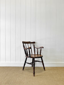 An Antique Penny-seat Stick Back Arm Chair