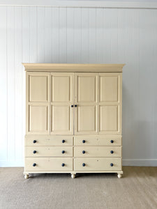 A Very Large and Useful English Pine Painted Housekeepers Cupboard