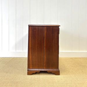 A English Georgian Chest of Drawers with Swan Neck Hardware