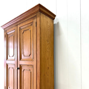 A 19th Century English Pine Linen Press Cupboard with Brass Hardware