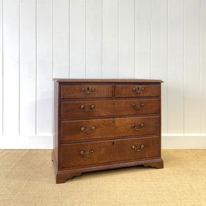 A English Georgian Chest of Drawers with Swan Neck Hardware