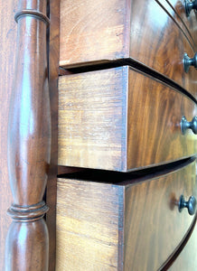 A Large Antique English Bow Front Mahogany Chest of Drawers