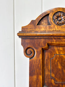 A Pair of English Oak Carved Hall Chairs