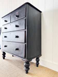 An Ebonized Antique English Chest of Drawers/Dresser