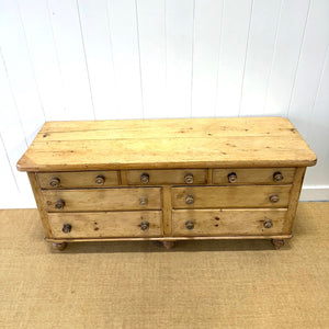 A Light Pine Antique English Sideboard on Tulip Feet c1890