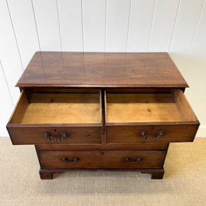 A English Georgian Chest of Drawers with Swan Neck Hardware