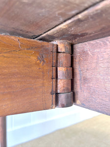 An Antique Cuban Mahogany Drop Leaf Dining Table with Pad Feet