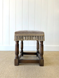 An Antique English Oak Foot Stool