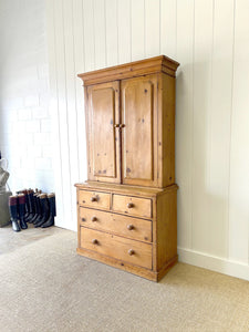 A 19th Century English Pine Linen Press Cupboard