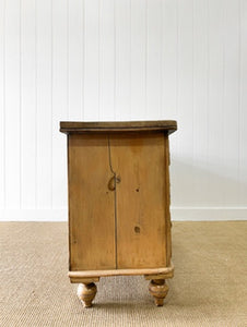 An Antique English Pine Sideboard