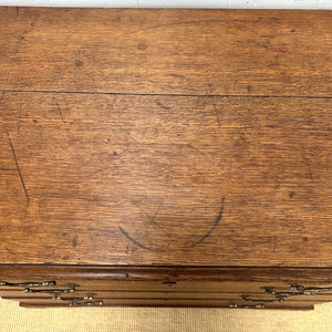 A English Georgian Chest of Drawers with Swan Neck Hardware