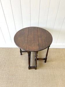 A Petite Antique English Country Oak Drop Leaf Gate Leg Table