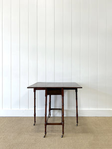 An Antique Regency Mahogany Spider Leg Table