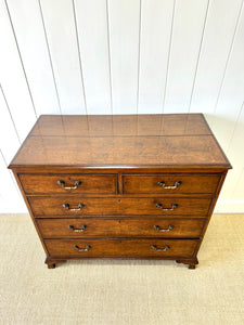 A English Georgian Oak Chest of Drawers with Swan Neck Hardware