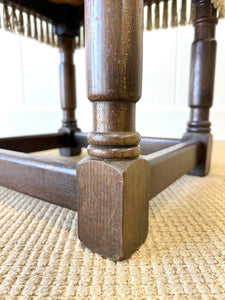 An Antique English Oak Foot Stool