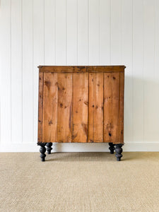 An Ebonized Antique English Chest of Drawers/Dresser