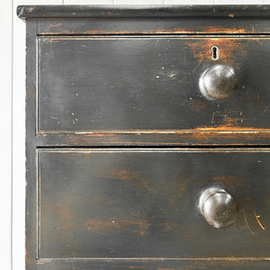 An Ebonized Antique English Chest of Drawers/Dresser