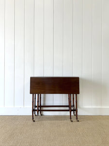 An Antique Regency Mahogany Spider Leg Table