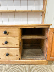 An Early 19th Century Monumental Pine Welsh Dresser or Cupboard