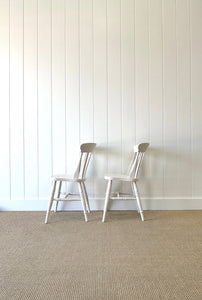 A Vintage Set of 4 White Slat Back Chairs