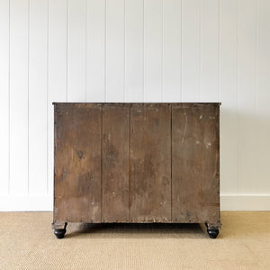 An Ebonized Antique English Chest of Drawers/Dresser