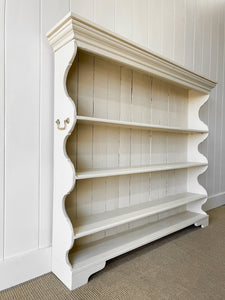 An Antique English Waterfall Bookcase in Cream