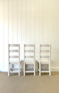 A Set of 6 Ladderback Chairs Painted White