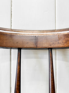 An Antique Penny-seat Stick Back Arm Chair