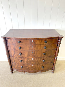 A Large Antique English Bow Front Mahogany Chest of Drawers