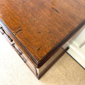 A English Georgian Chest of Drawers with Swan Neck Hardware