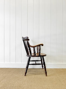 An Antique Penny-seat Stick Back Arm Chair