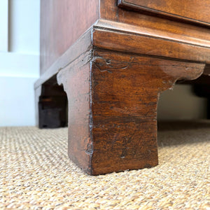 A English Georgian Chest of Drawers with Swan Neck Hardware