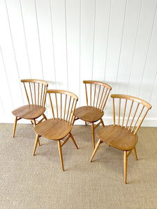 A Set of 4 Ercol Stick Back or Windsor Chairs