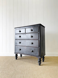 An Ebonized Antique English Chest of Drawers/Dresser