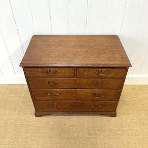 A English Georgian Chest of Drawers with Swan Neck Hardware