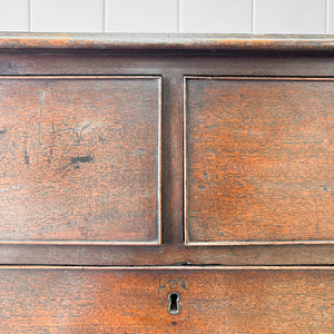 A English Georgian Chest of Drawers with Swan Neck Hardware