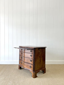 A Unique Serpentine Front Antique Mahogany Chest of Drawers