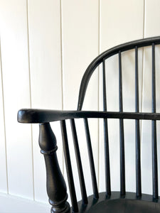 A Set of Four Black Windsor Armchairs