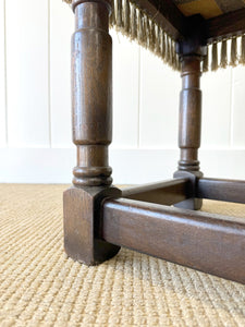 An Antique English Oak Foot Stool